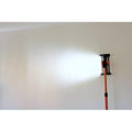 Edma cordless LED inspection light throwing a wide beam across a plastered wall